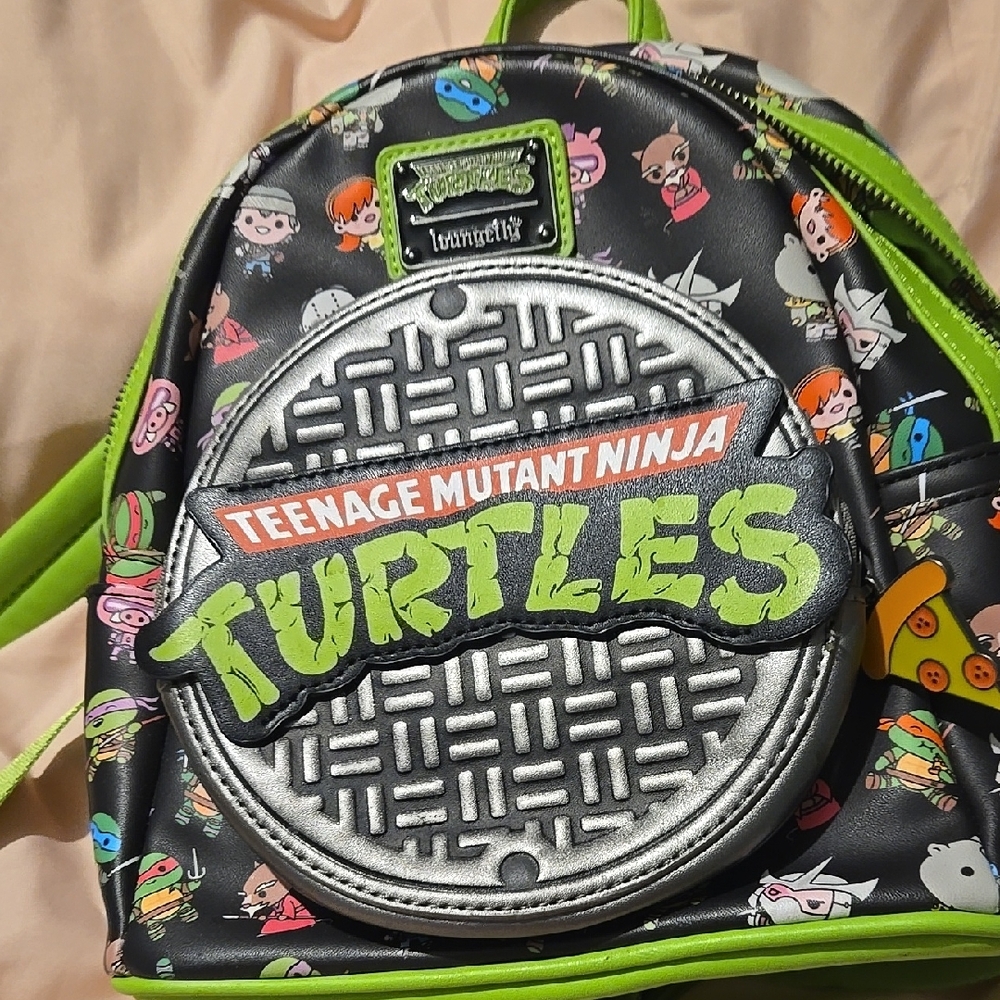 Loungefly Teenage Mutant Ninja Turtles Black and Green Backpack